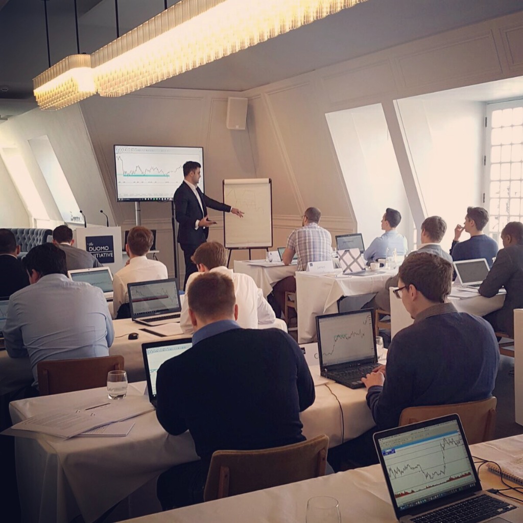 Nicholas Puri teaching a live trading seminar